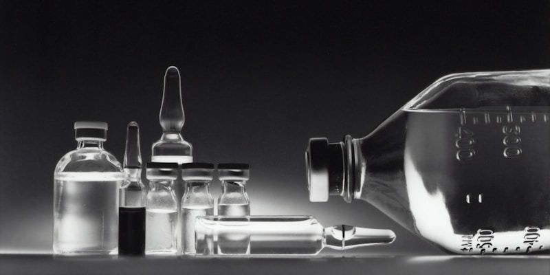 Pharmacist preparing medication for a mail-order prescription shipment